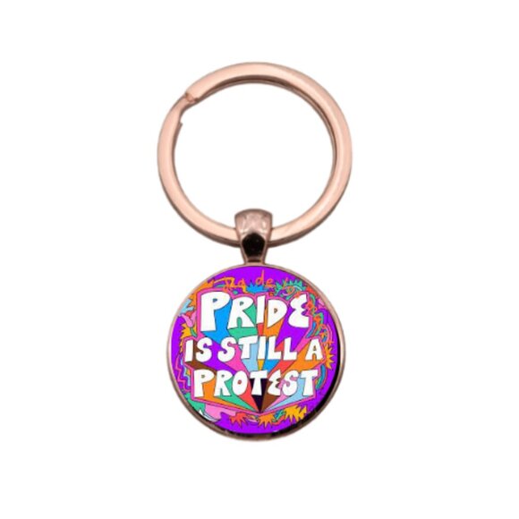 PRIDE IS STILL A PROTEST CUSTOM KEY RING - Picture 1 of 5